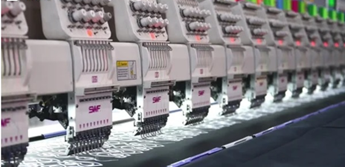 machines stitching intricate patterns on fabric.